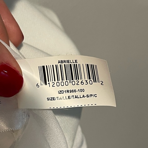 BCBG Abrielle Peplum Top in Cream - Picture 8 of 8